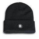 A black beanie with a black & white striped patch on the front.