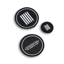 A set of three circular black patches of different sizes, with white text and designs, the largest with the text 'THE JUVENTUS STORY' and two smaller ones with 5 vertical white stripes.