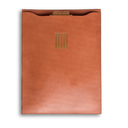 A brown leather pouch with five vertical stripes that are gold embossed in the center.