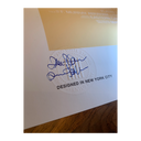Extreme close up of bottom left side of movie poster 'The Juventus Story' that shows the movie director's signatures and authenticity embossing.